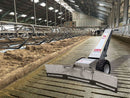 Westermann WS800 Vario Scraper with Pushing Shield attachment, featured cleaning in a cow shed