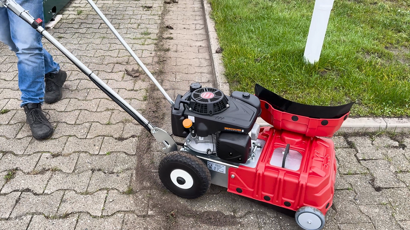 Westermann WKB330 Weed Ripper machine being used to clean block paving