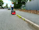 WKB430 clearing weeds from kerb edges