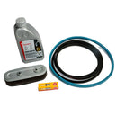 A studio image of a service kit, featuring a bottle of oil, a set of belts, an air filter and a spark plug