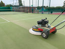Tennis court being cleaned by a Westermann WR870 Moss Brush