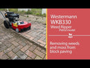 Removing weeds and moss from block paving with WKB330 Petrol Westermann Weed Ripper